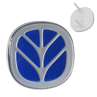 Emblemat logo maski New Holland TL100 TL100A TTM115 TM120 TM135 TM150 TS100 Fiat M100 M135 Ford 8360 82005611 82003096