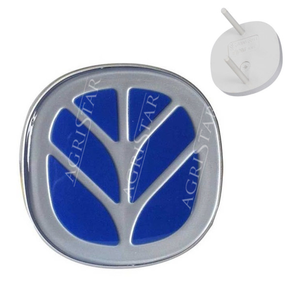 Emblemat logo maski New Holland TL100 TL100A TTM115 TM120 TM135 TM150 TS100 Fiat M100 M135 Ford 8360 82005611 82003096